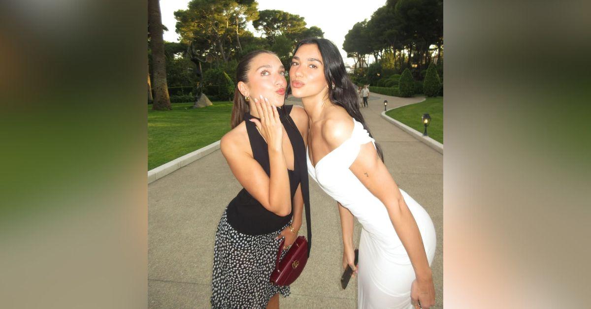 image of Dua Lipa wore a red bikini while Rina went with an orange two-piece.