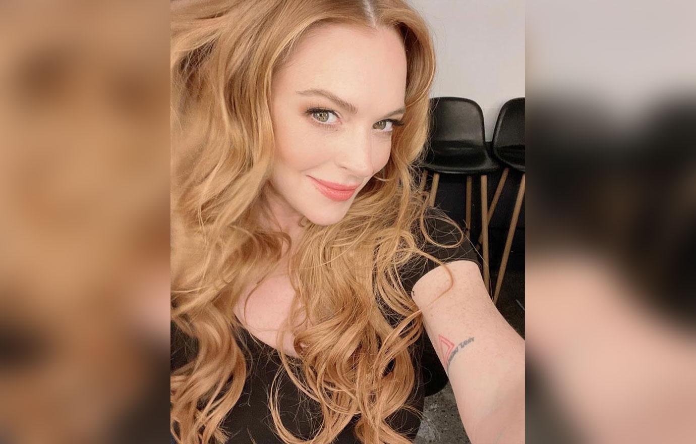 lindsay lohan posts year end recap featuring multiple photos of fiance bader shammas