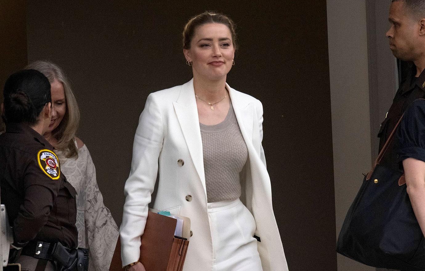 amber heard relaxes on vacation with pal who was banned from johnny depp trial