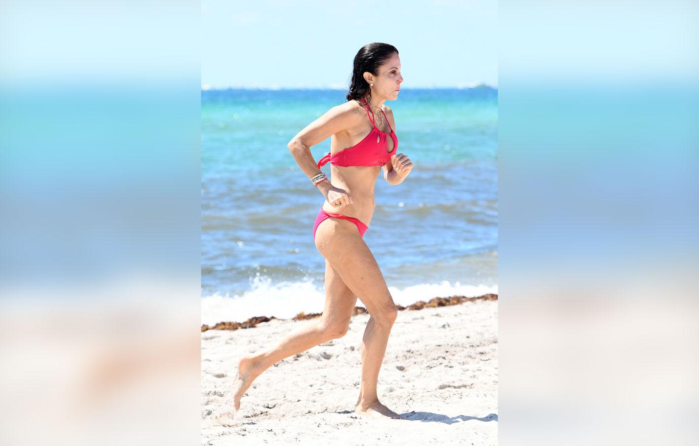 bethenny frankel wears a hot pink bikini and enormous engagement ring on the beach in miami