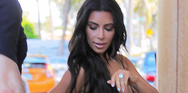 Kim Kardashian shows a lot of side boob when out and about in Miami, FL