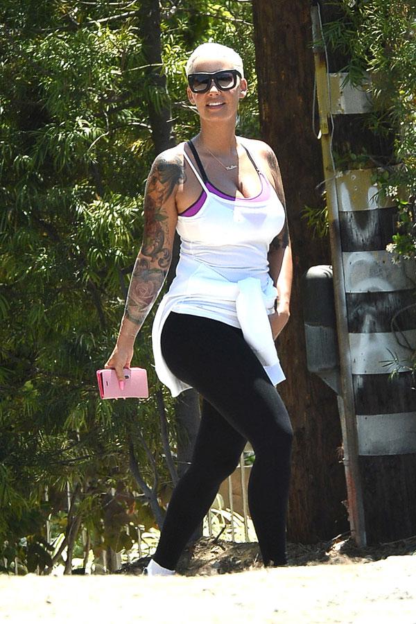 Amber Rose Squats With Perfect Form As She Hikes With A Personal Trainer