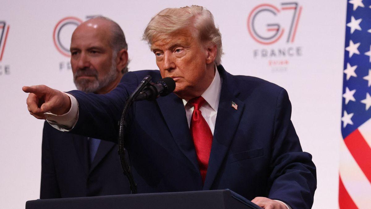 Image of Donald Trump appeared alongside giant robots in AI-generated images shared on Truth Social.