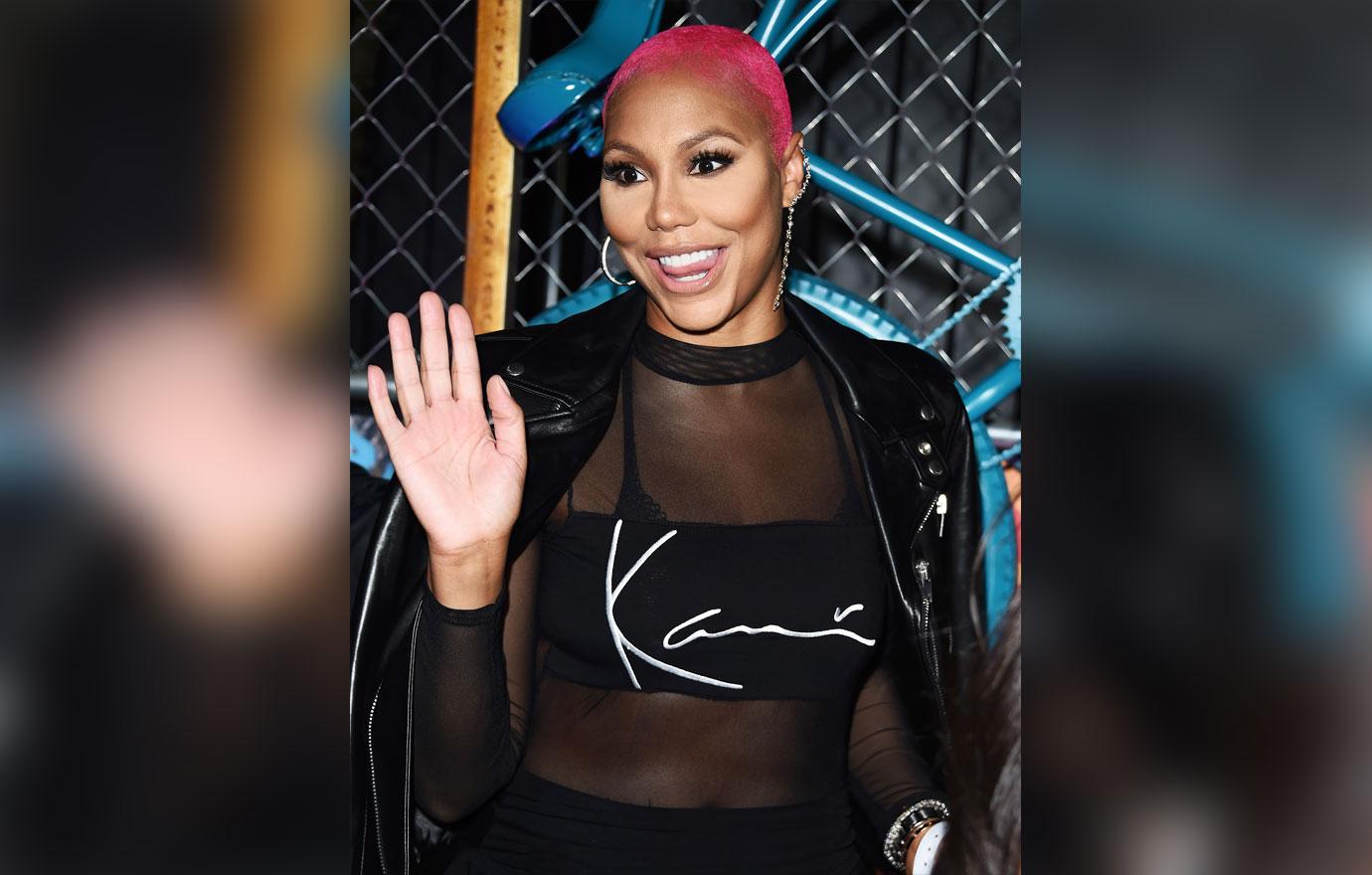 Tamar Braxton with short pink hair