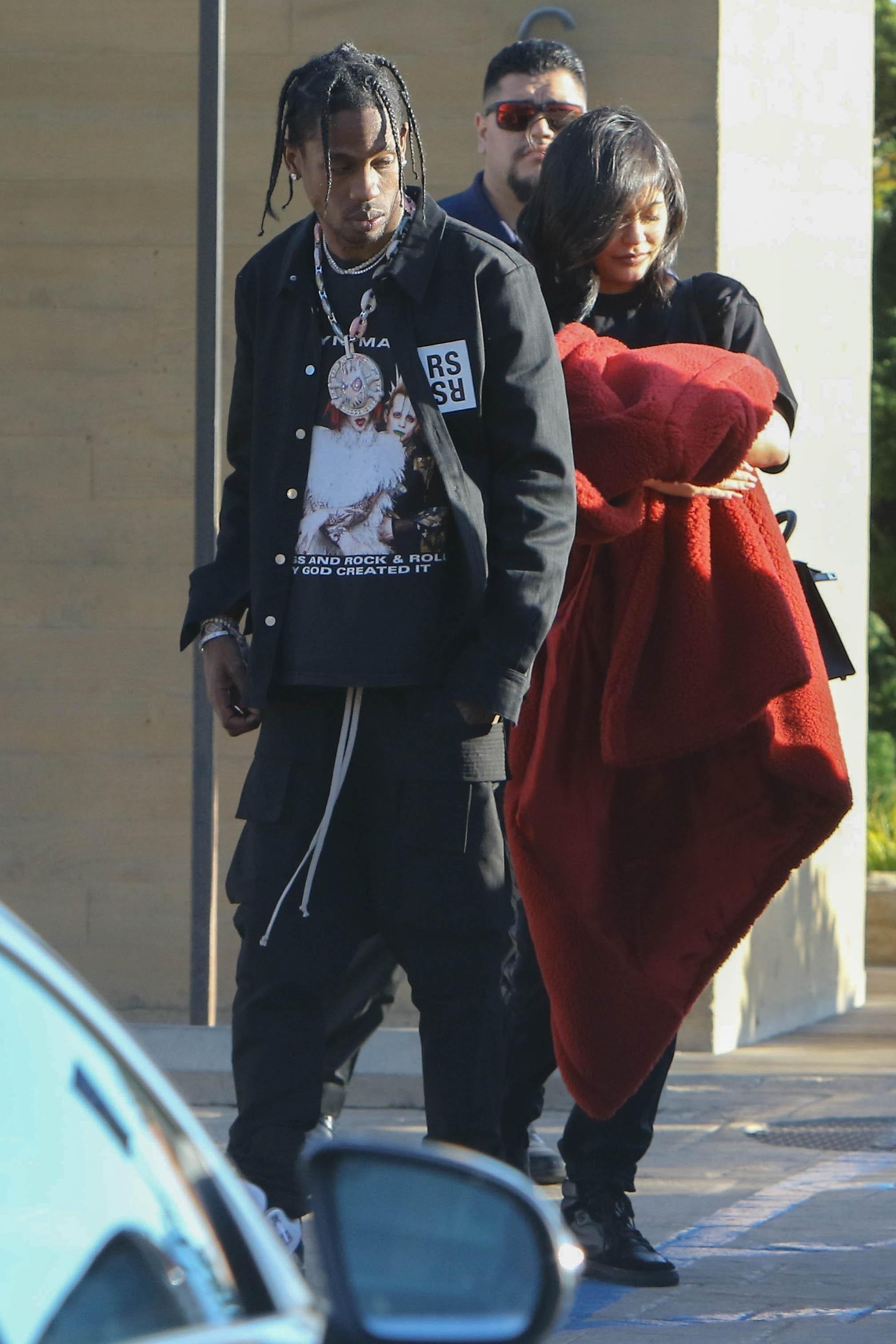 New parents Kylie Jenner and Travis Scott leave after lunch at Nobu