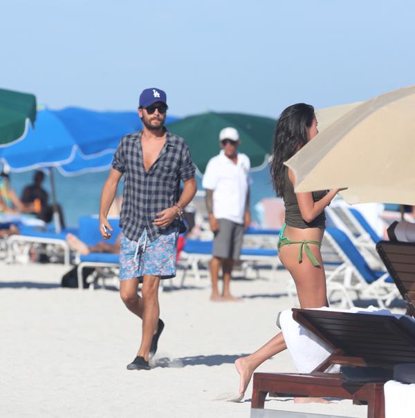 Scott Disick enjoys a walk on the sand in sunny Miami FL.