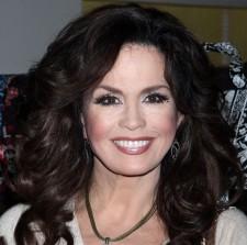 2009__11__marieosmond 225×223.jpg