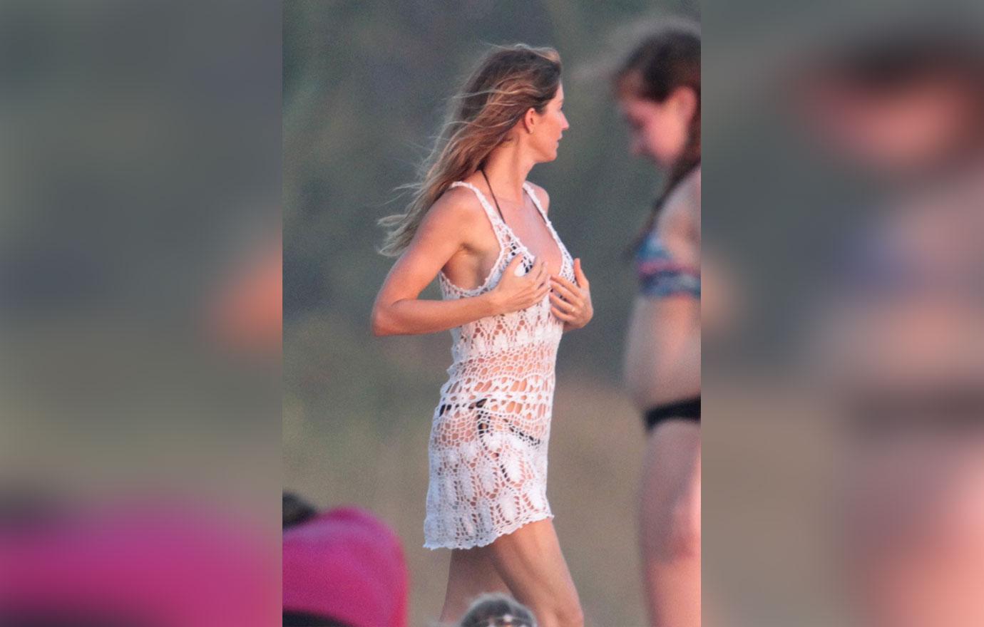 Gisele bundchen shows off bikini body on beach vacation 05