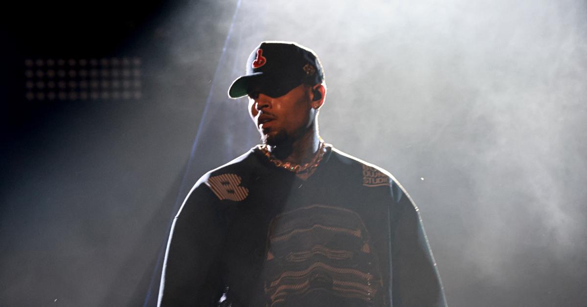 chris brown lawsuit warner bros sexual assault allegations libel