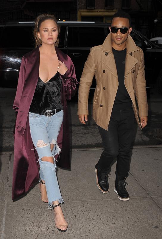 Chrissy Teigen and John Legend arrive hand in hand at The Bowery Hotel