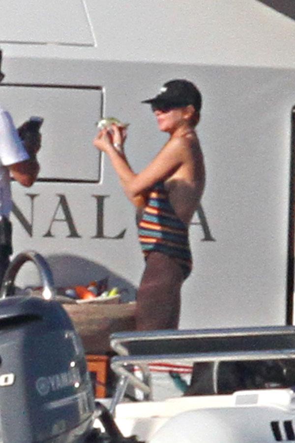 lindsay lohan pregnant baby bump one piece bathing suit