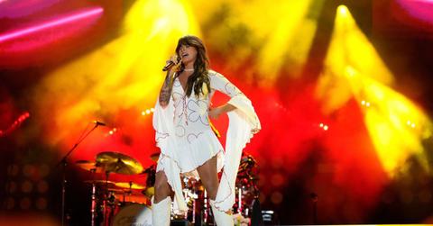 Langley's chart-topping hit just edged out a Mariah Carey holiday classic for the longest run at No. 1.