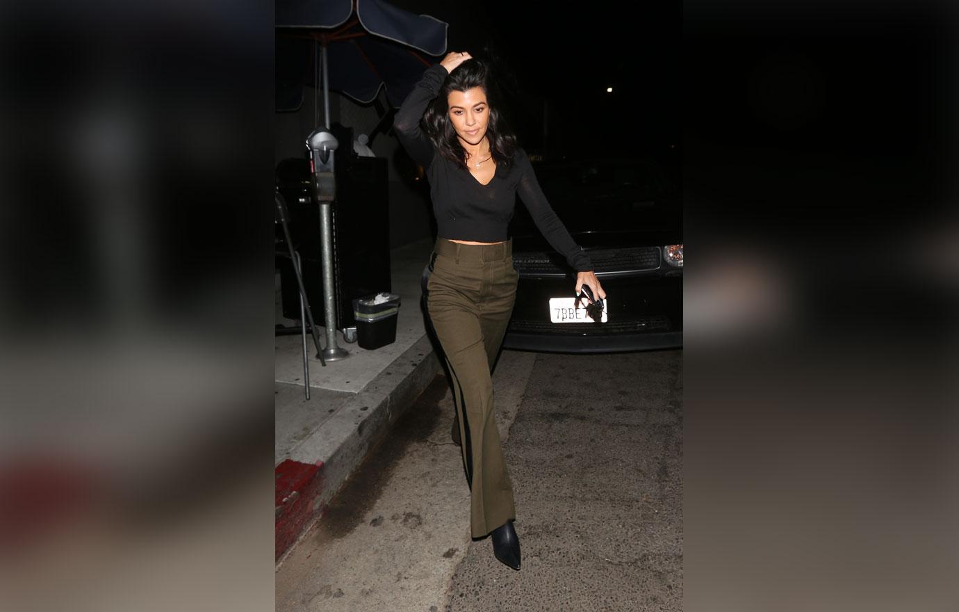 EXCLUSIVE: Kourtney Kardashian is spotted leaving vegan restaurant after having dinner with musician Travis Barker