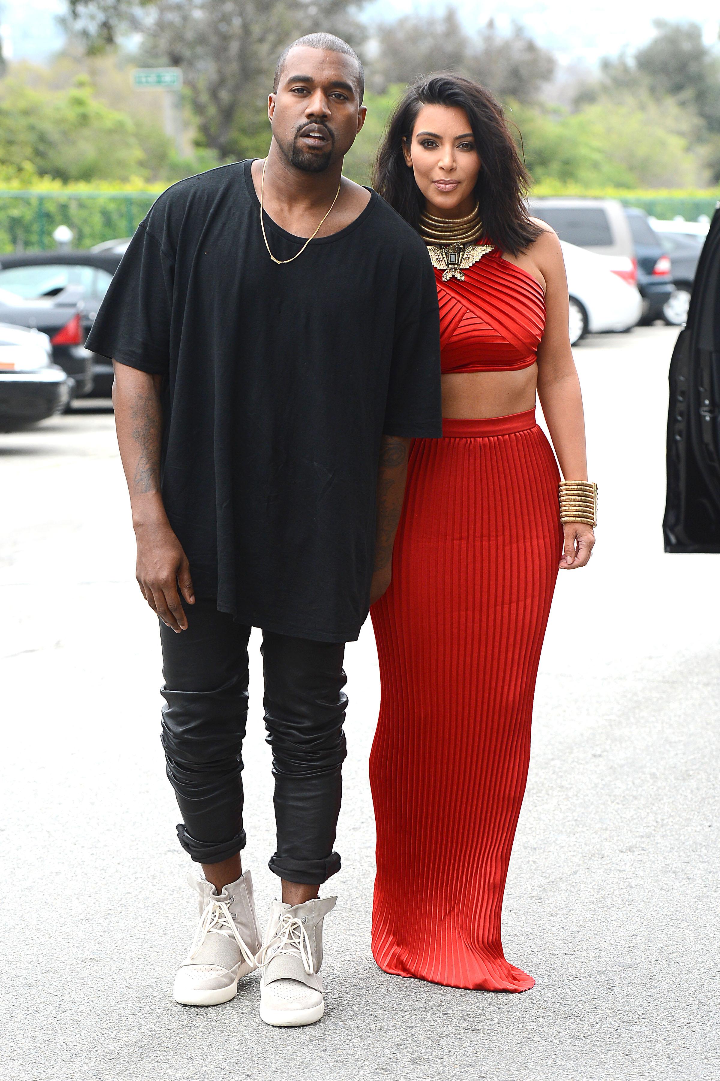 Kanye West and Kim Kardashian arrive at the Roc Nation Luncheon