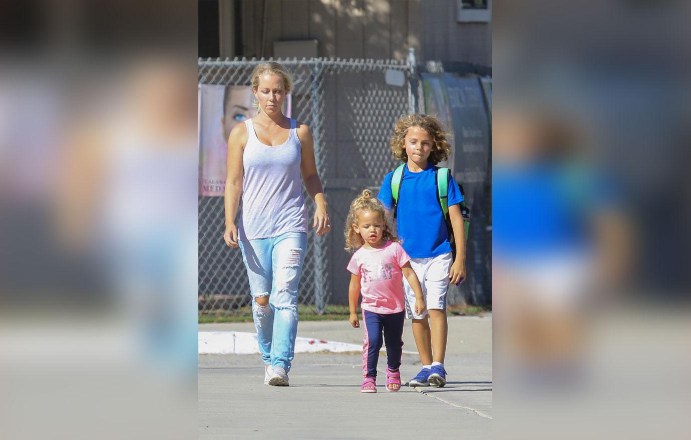 *EXCLUSIVE* Kendra Wilkinson attends a game of baseball with her kids