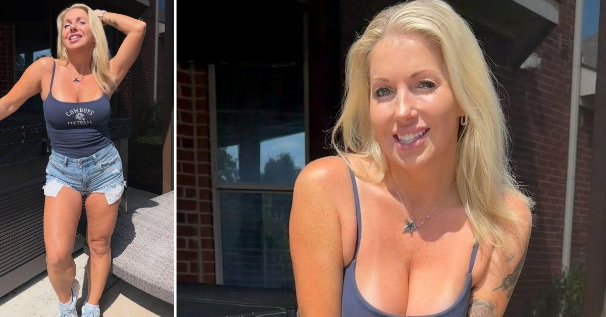 Courtney Ann poses outdoors in a dark tank top with “Cowboys Football” printed on it and denim shorts.