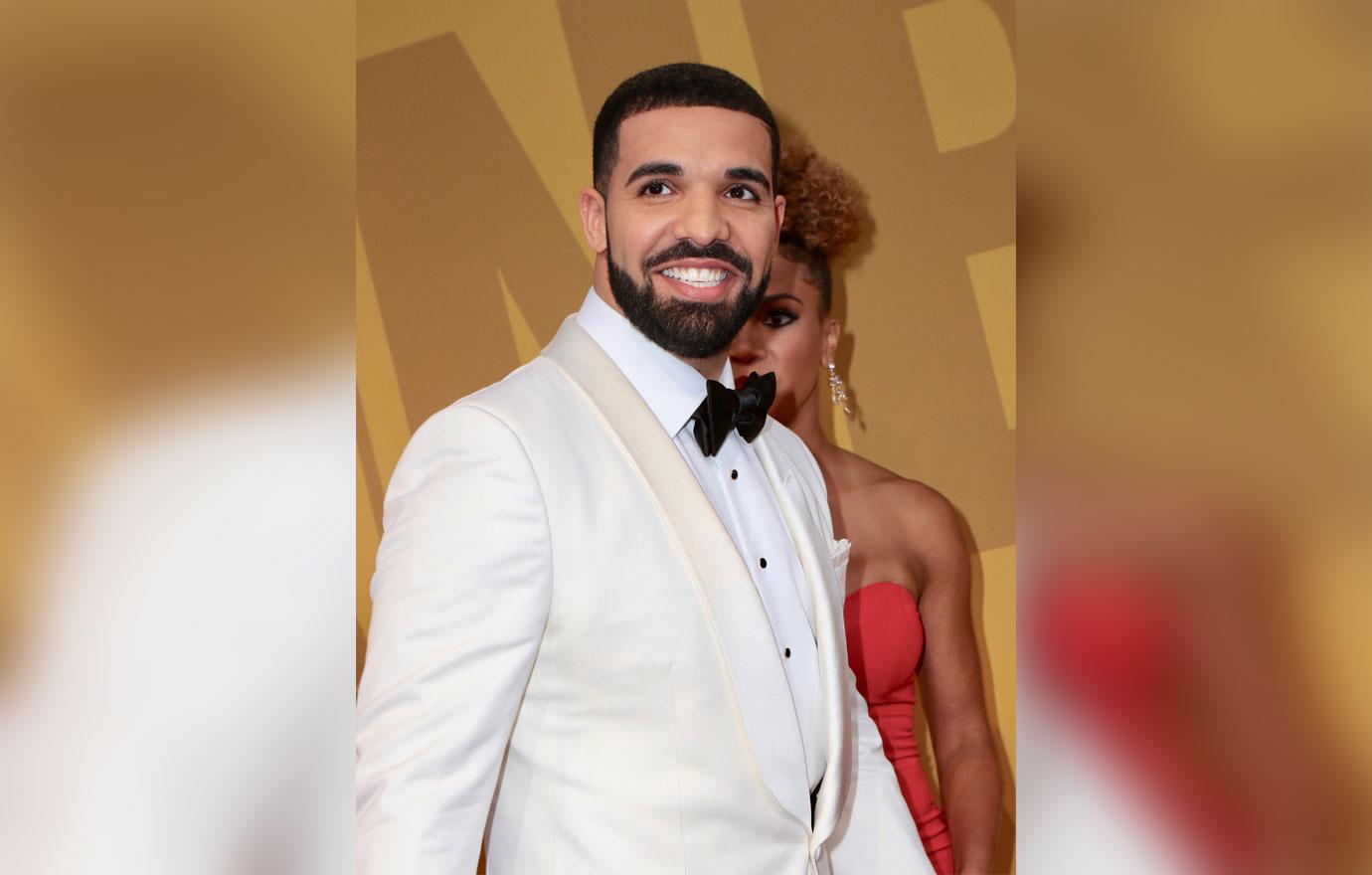 Drake in white suit