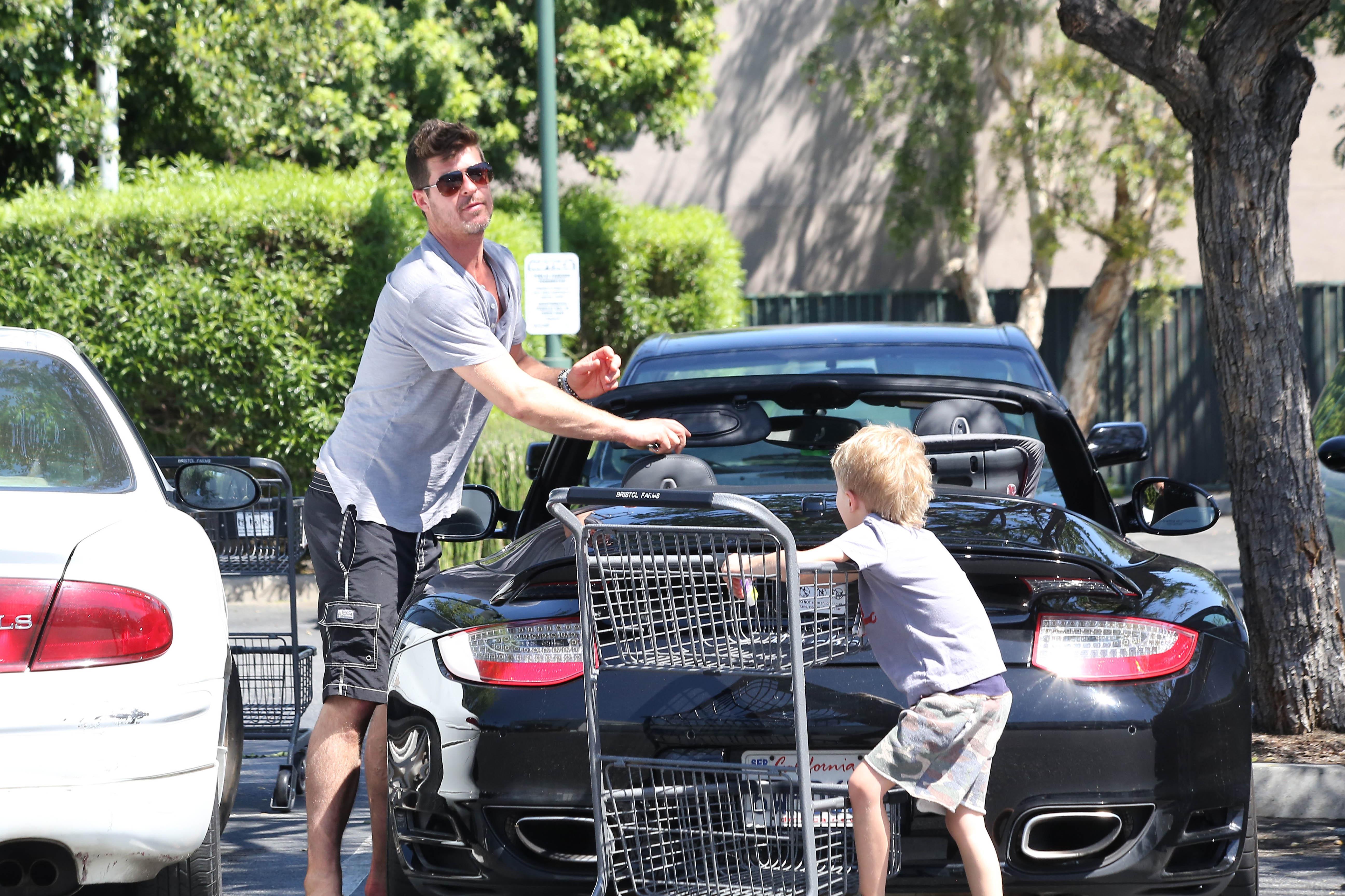 *EXCLUSIVE* Robin Thicke and son Julian go Easter shopping