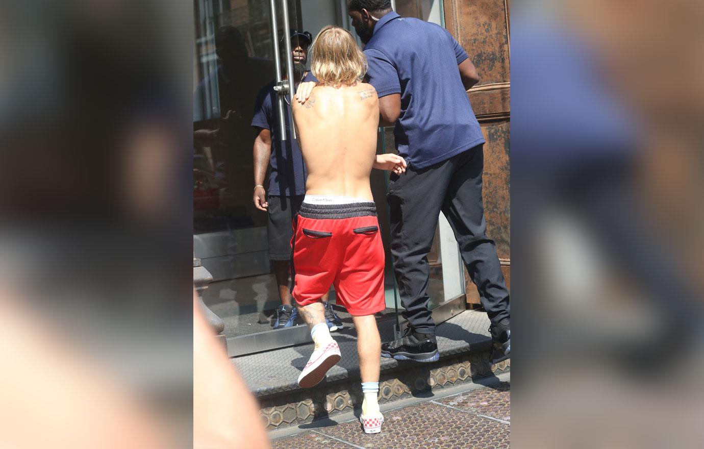 Justin bieber bares chest tattoos shirtless in NYC 5