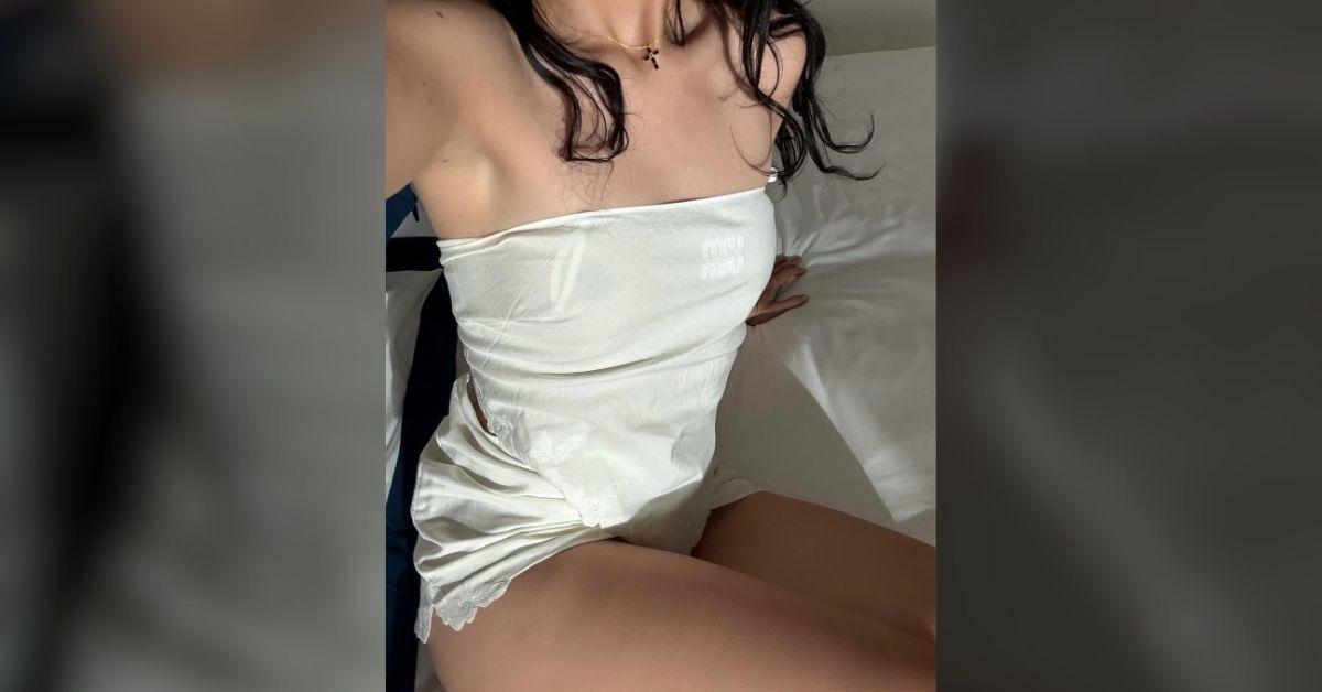 image of Camila Cabello stunned in a two-piece off-white matching set.