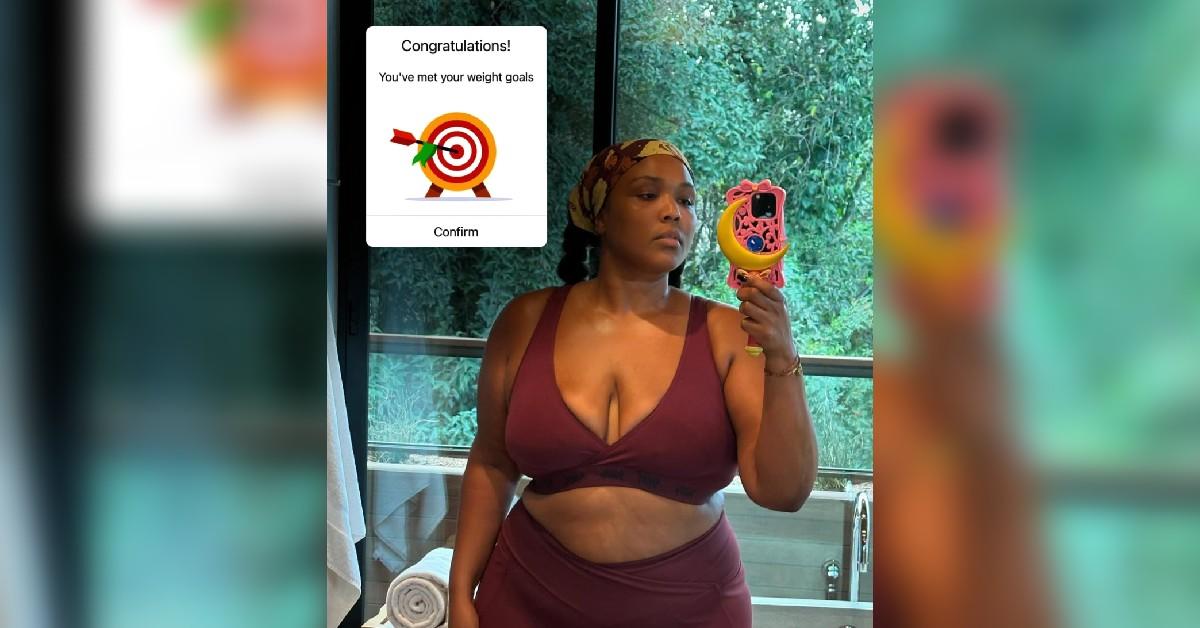 lizzo behind display black bra underwear weight loss journey photo