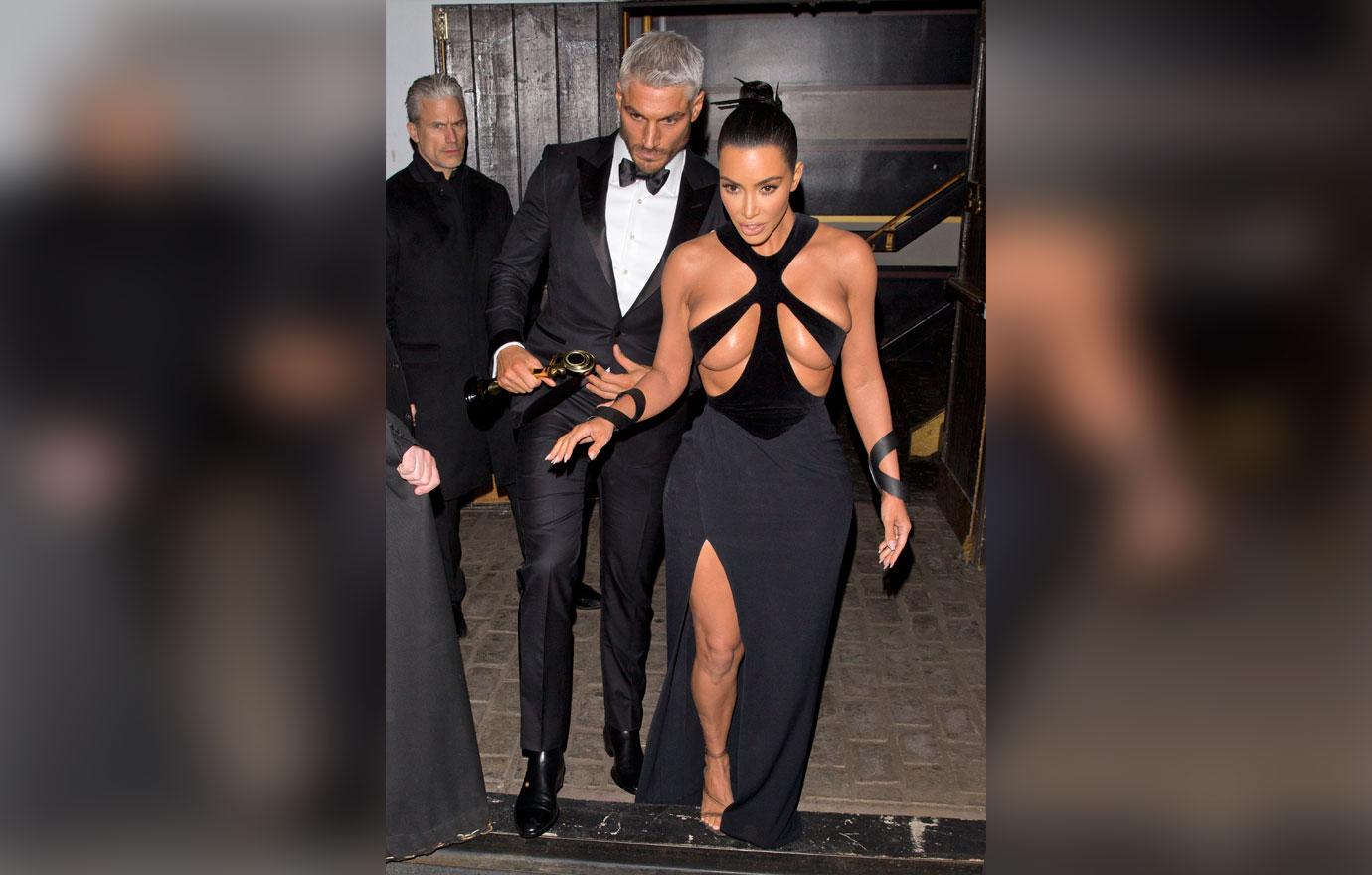 Kim Kardashian wears a &#8216;Barely There&#8217; dress as she was seen leaving  &#8216;The Avalon&#8217; in Hollywood with her British Hair Stylist Chris Appleton who was looking sharp in a Tuxedo and holding a Gold award