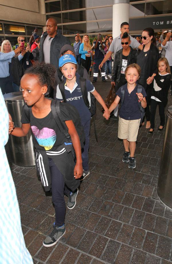 Brad pitt angelina jolie kids travelling airport