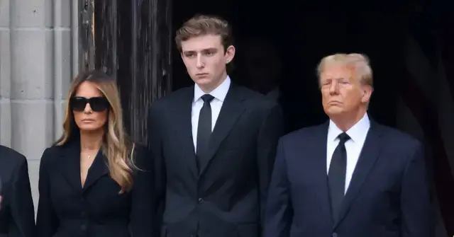 Photo of Melania, Barron and Donald Trump.