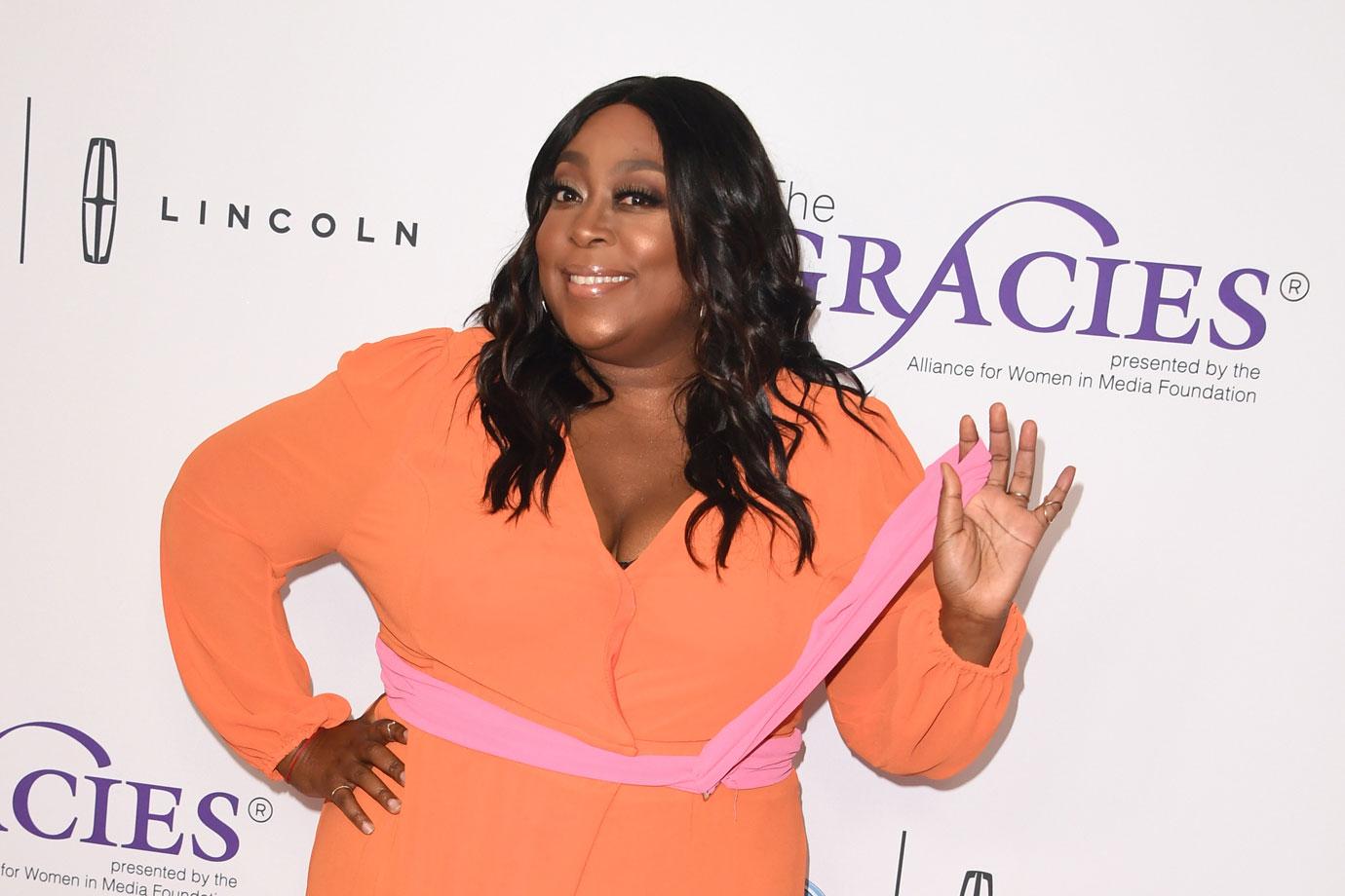 loni love wearing orange dress loni love oj simpson