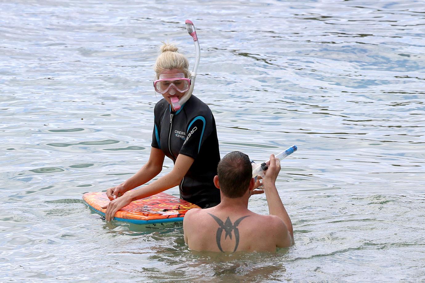 tarek el moussa and heather rae young hit the beach on vacation in maui