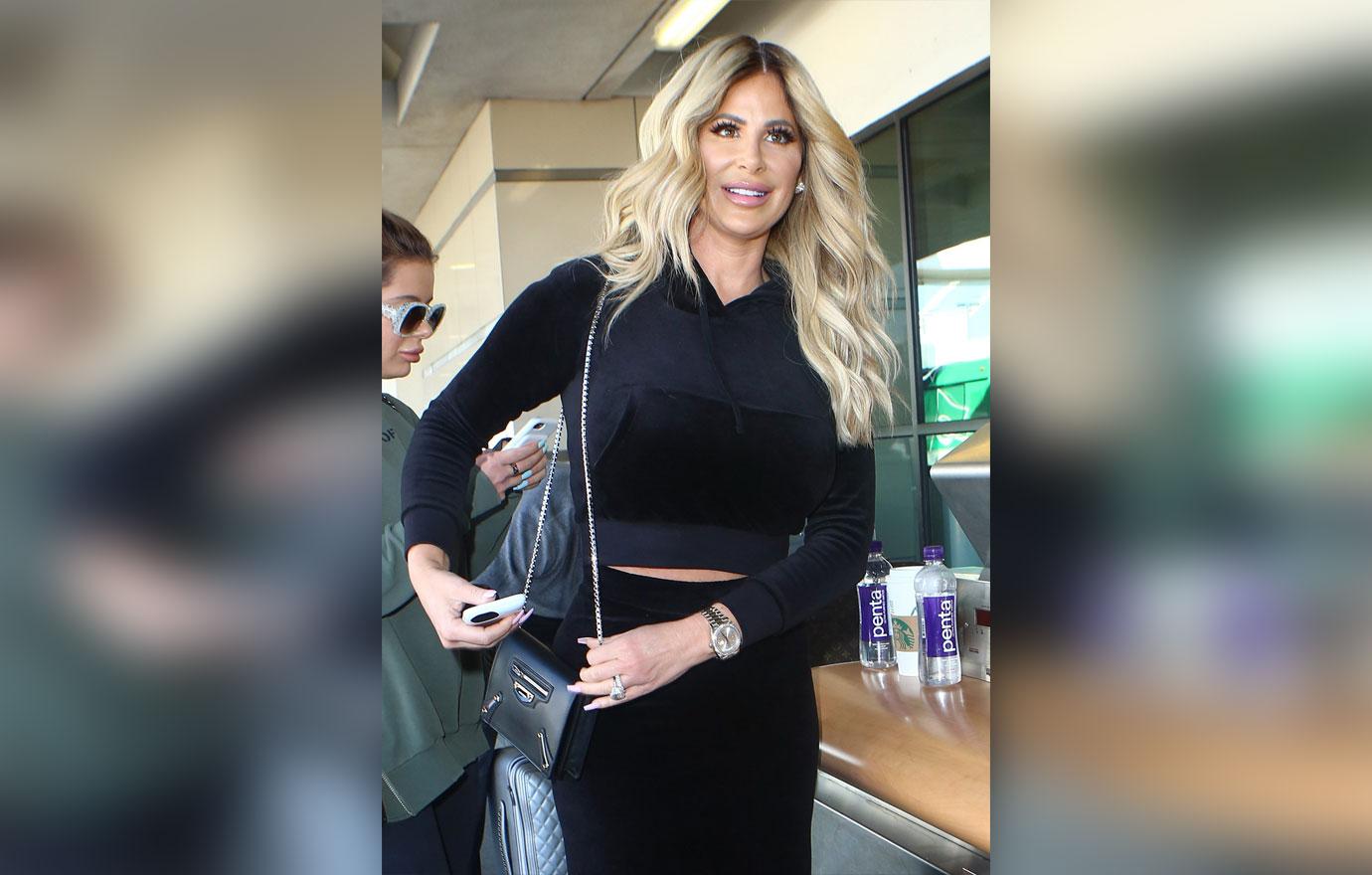 Kim Zolciak jets out of LA with husband Kroy Biermann