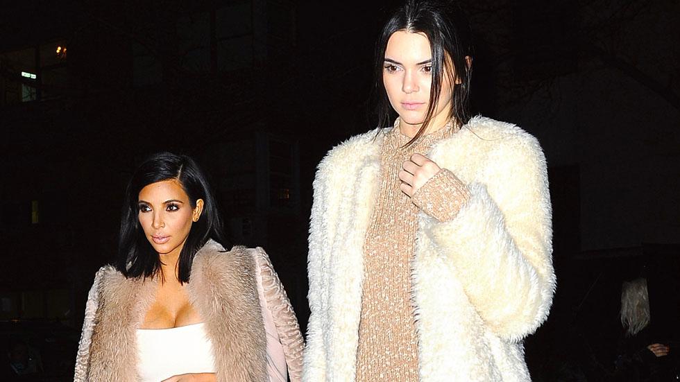 Kim Kardashian and Kendall Jenner dress up in matching white and beige outfits while out for dinner in NYC.