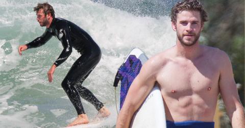 Liam hemsworth shirtless surfing beach photos 04
