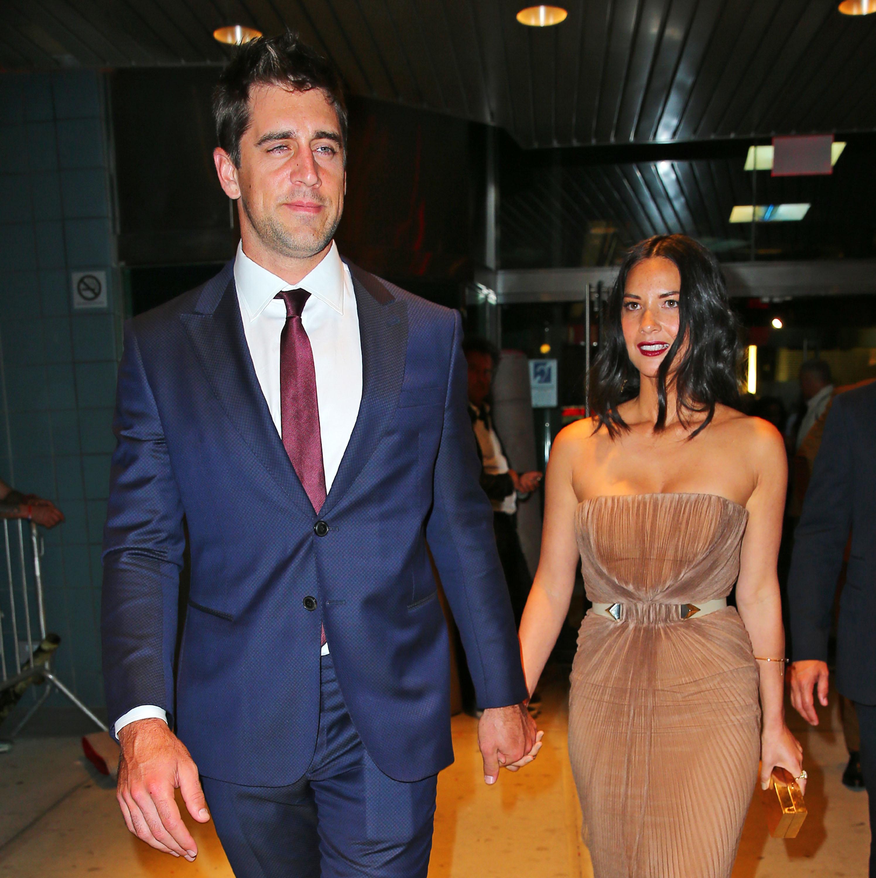 Olivia Munn and Aaron Rodgers are all smiles and holding hands when coming out of the SVA Theater in NYC