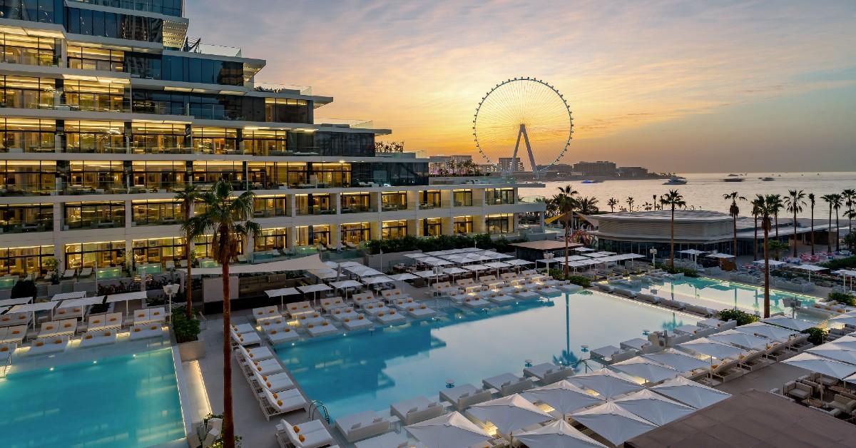 The outdoor pool and Playa Pacha at FIVE LUXE.