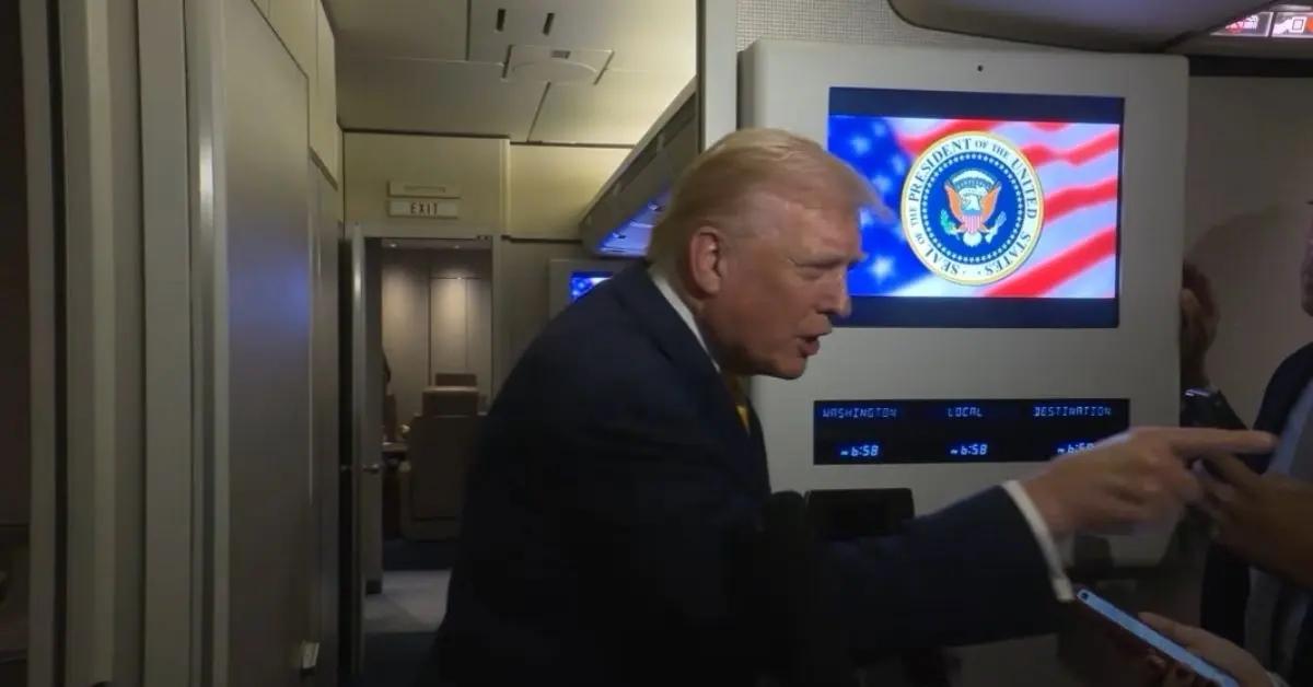 Photo of Donald Trump pointed a finger at a female reporter when he snapped at her.