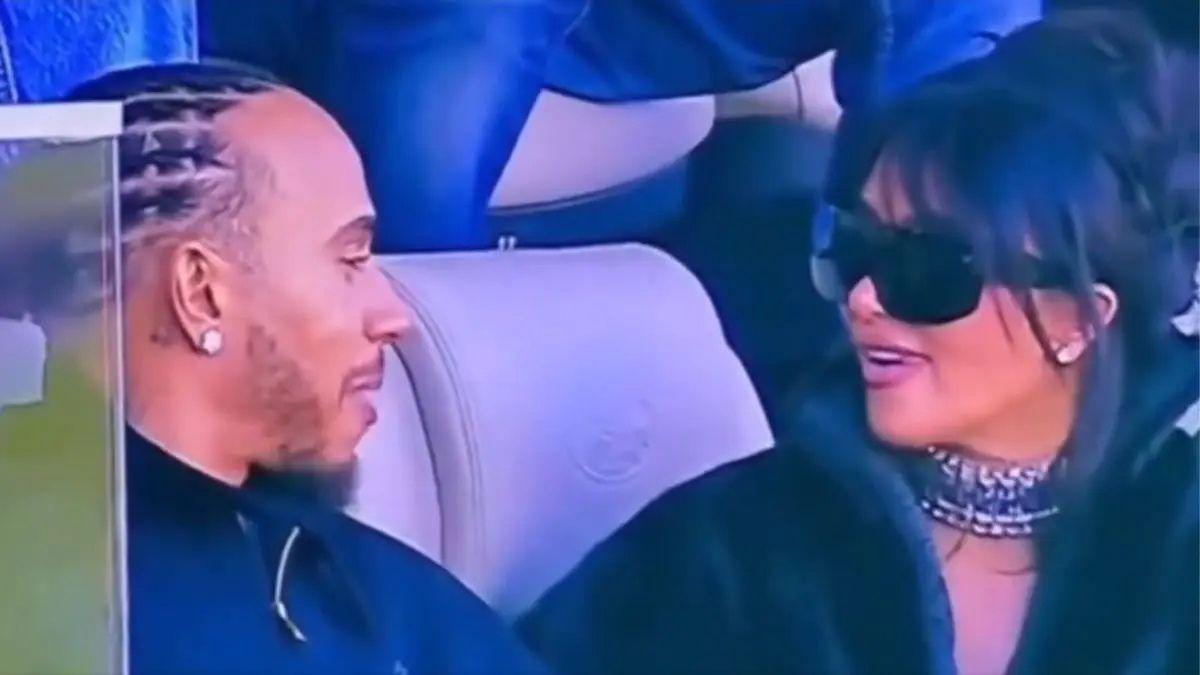 Photo of Kim Kardashian and Lewis Hamilton sat next to each other at the 2026 Super Bowl.