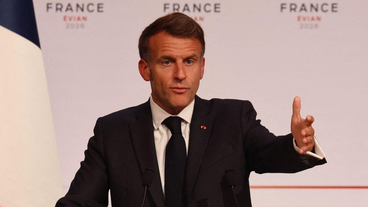 Image of Emmanuel Macron greeted Donald Trump with a restrained handshake.