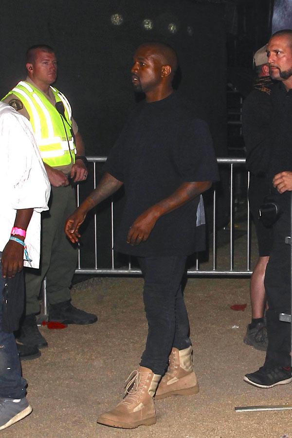 Kanye West Checks Out Drake's Coachella Set After Giving Another