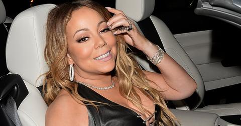 Mariah Carey flashes some cleavage in black leather leaving Catch