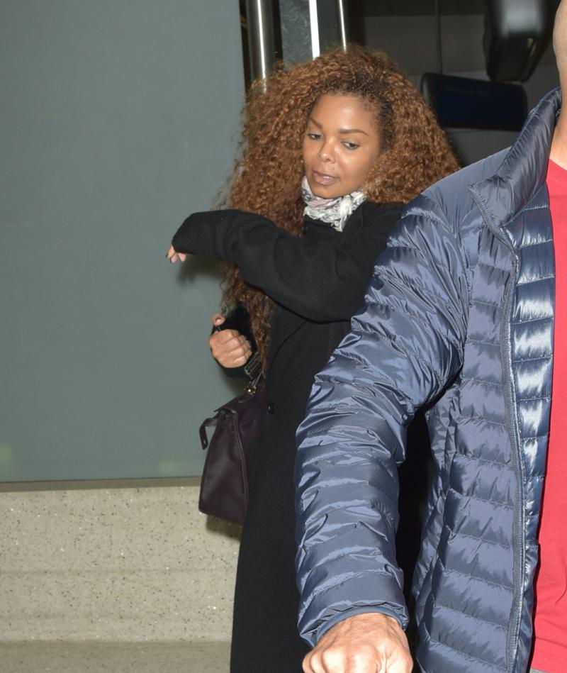 Janet Jackson arrives at LAX with her husband Wissam Al Mana close behind