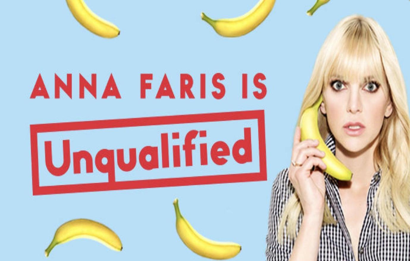 Anna Faris takes a banana to her ear, like a phone, in a promo image for her podcast Anna Faris is Unqualified.