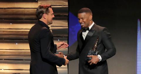 Leonardo DiCaprio Presents Jamie Foxx With Award At ABFF