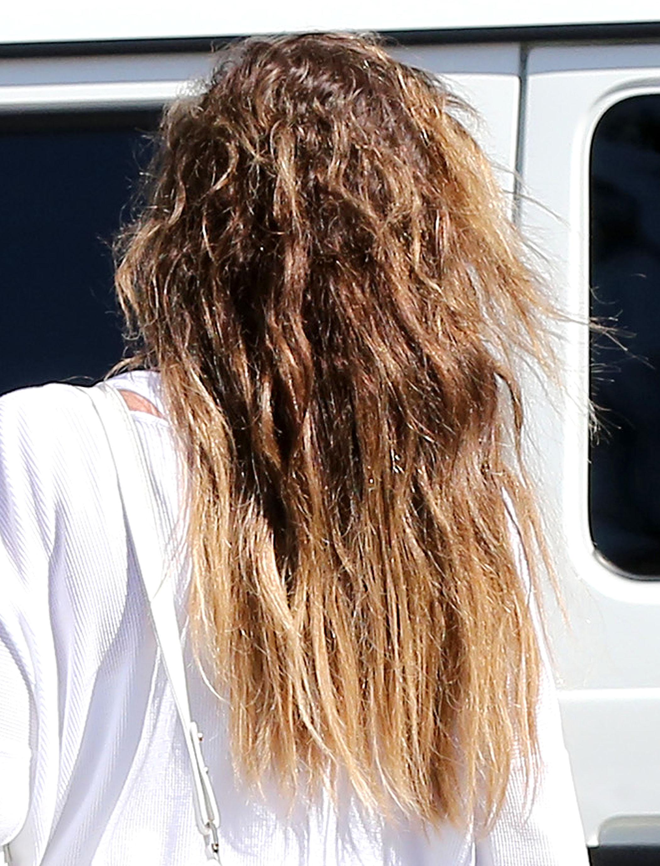 YIKES! Khloe Kardashian Sports Scary Hair Extensions While Halloween  Costume Shopping