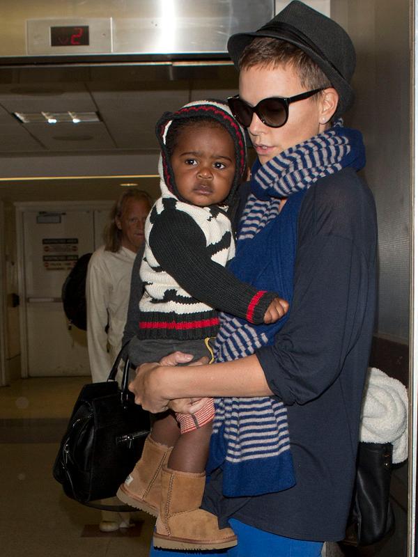 Charlize Theron and her baby Jackson seen arriving at LAX on a flight from Miami