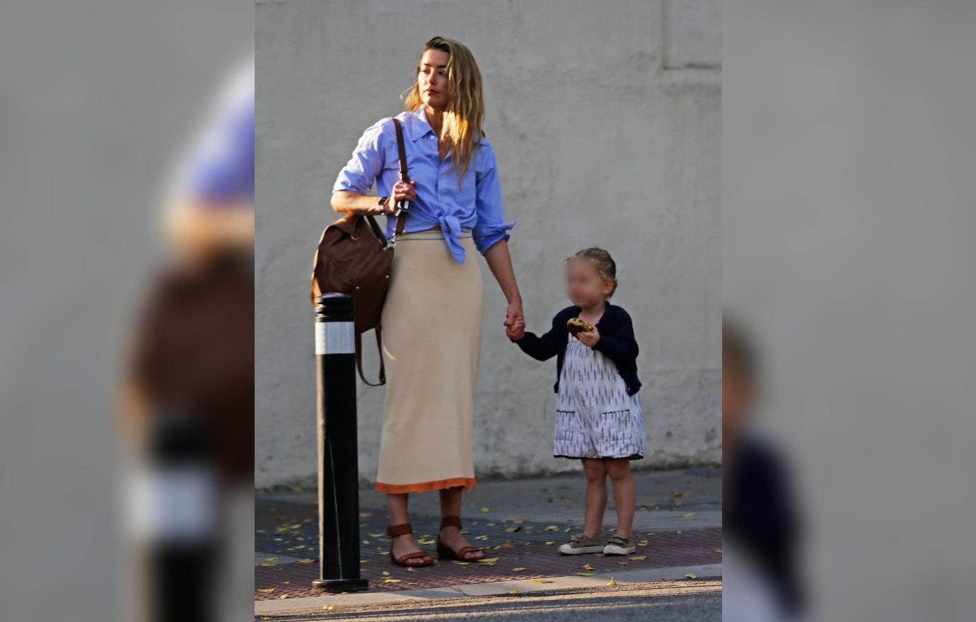 Amber Heard & Daughter Oonagh, 3, Step Out In Spain: Photos