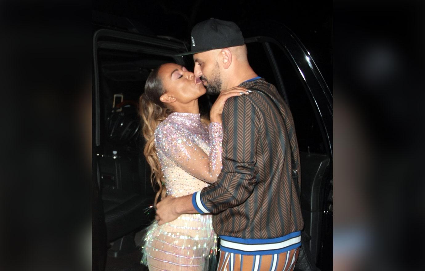 Mel B passionately kisses her boyfriend, Gary Madatyan as they leave Simon Cowell&#8217;s party