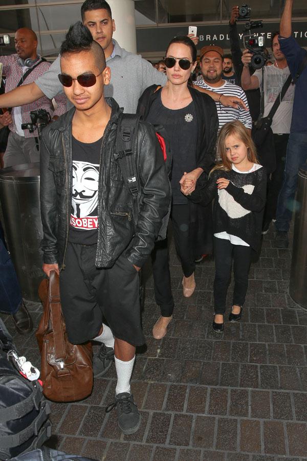 Brad pitt angelina jolie kids travelling airport