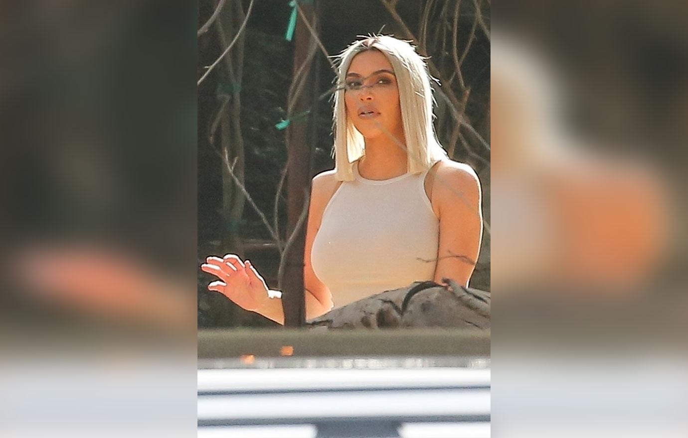 *EXCLUSIVE* The Kardashian sisters get busy filming in Malibu