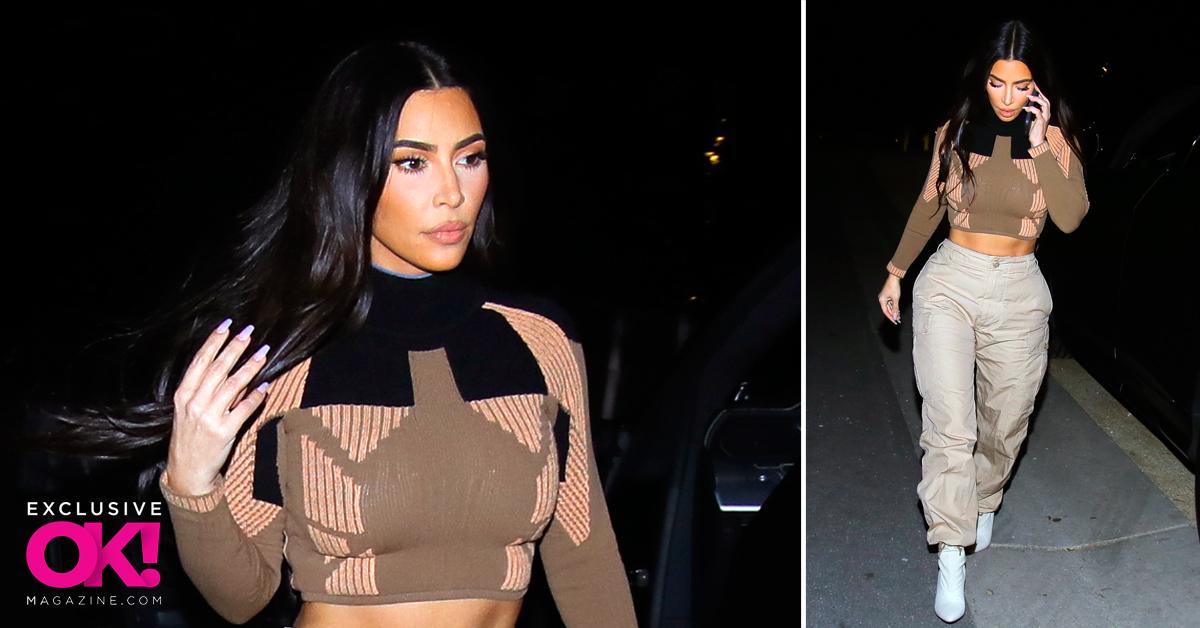 Kim Kardashian rocks a skin-tight tank top and stone-washed cargo pants  while out with